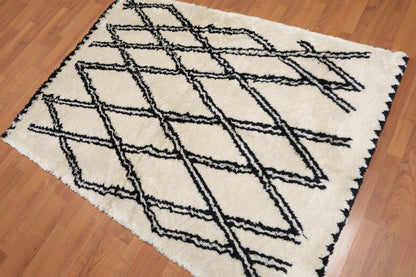 4'3" x 6' Handmade Geometric Pattern Moroccan Shag Area Rug Beige