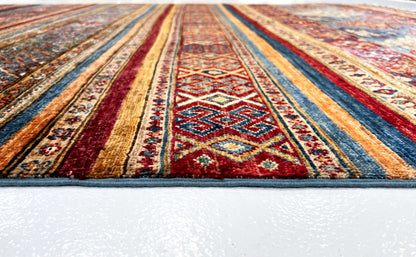 Khorjin (6'01"x8'07") blue/mulitcolor