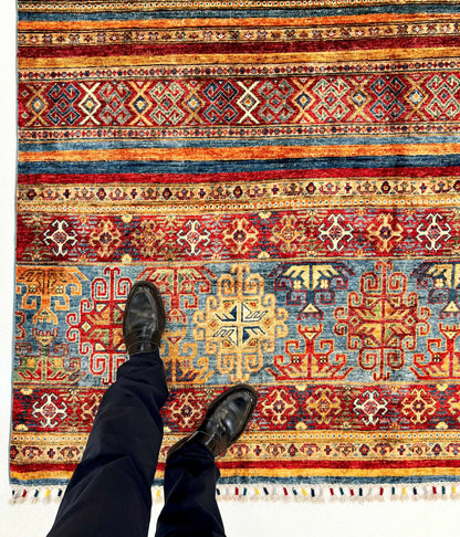 Khorjin (6'01"x8'07") blue/mulitcolor