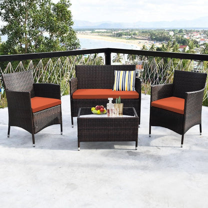 Rattan Patio Set With Cushioned Chairs And Glass Table