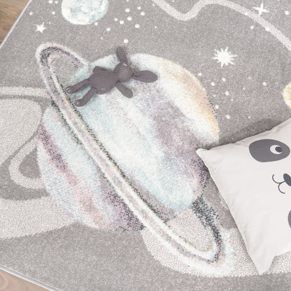 Kids Rug Nino Space with pastel colored Planets and Stars in Grey